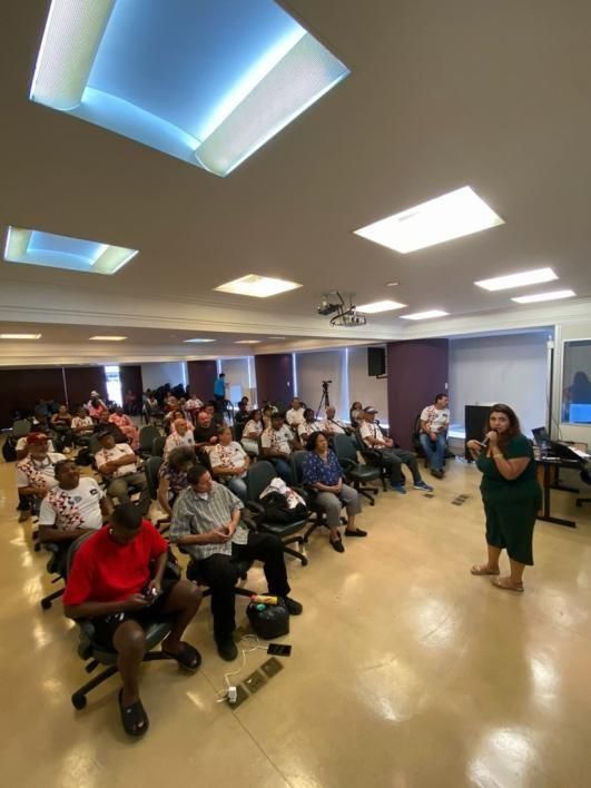 Auditório cheio durante atividade do projeto