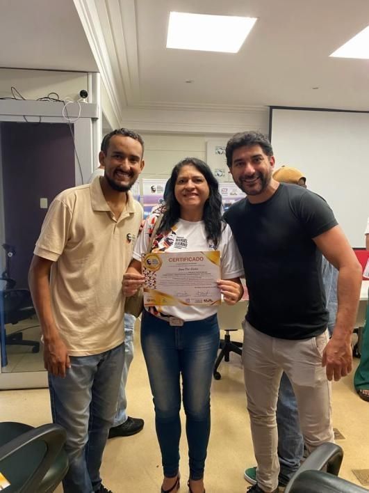 Equipe com participante na certificação